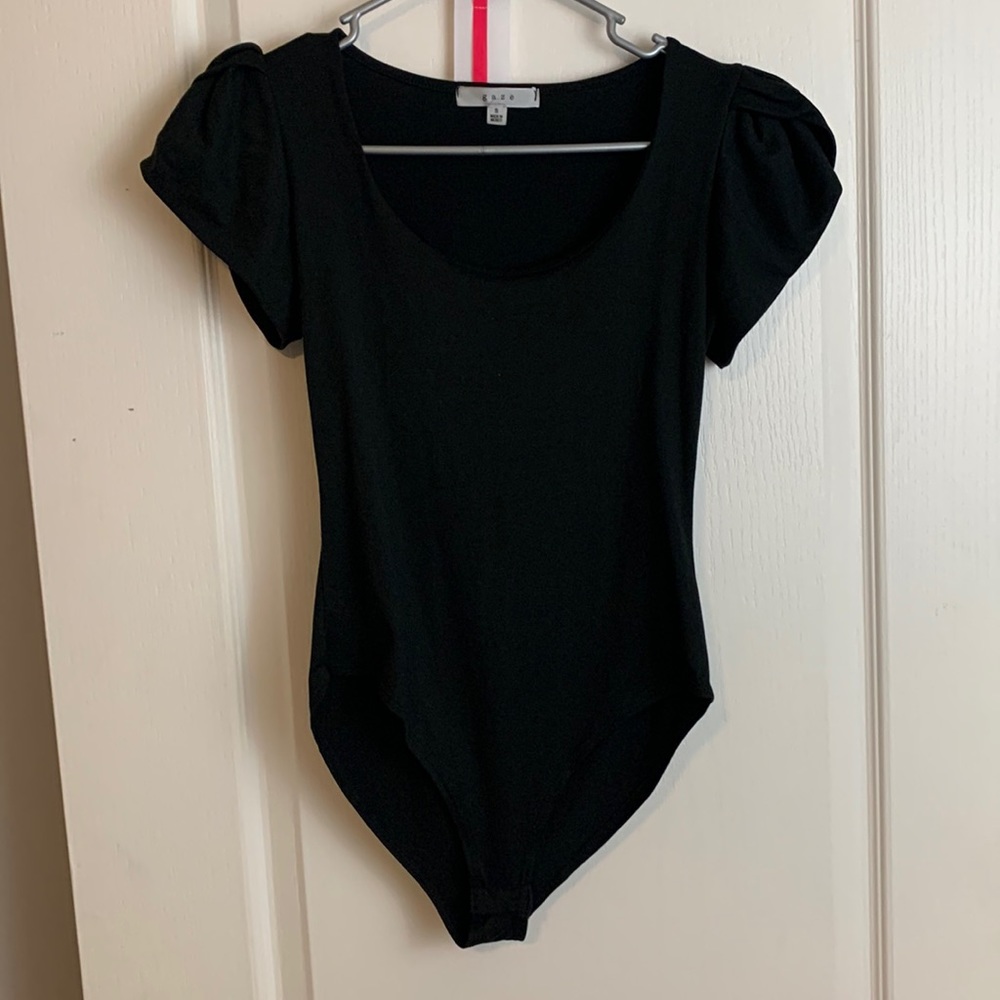 Black body suit with puffy sleeves